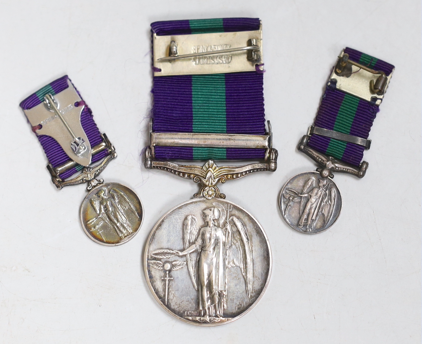 A G.S.M. medal with Palestine clasp and two miniature medals.